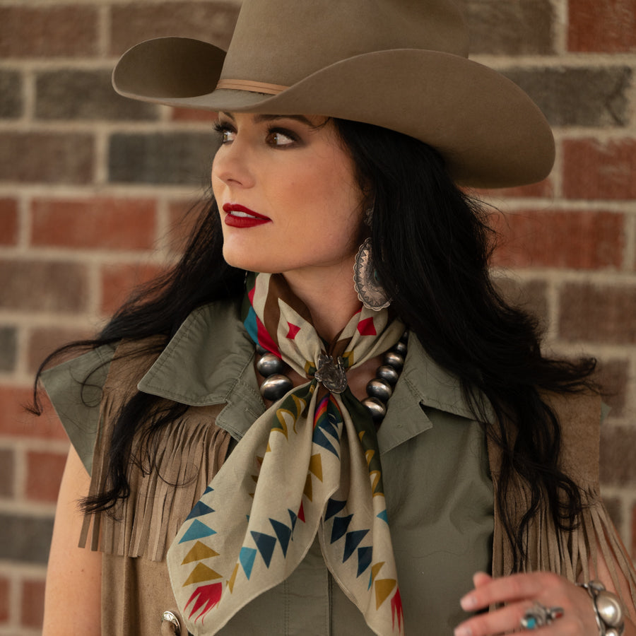 Fringe Cross Me Bandana Tan folds into a triangle and ties cowboy style cowboy
