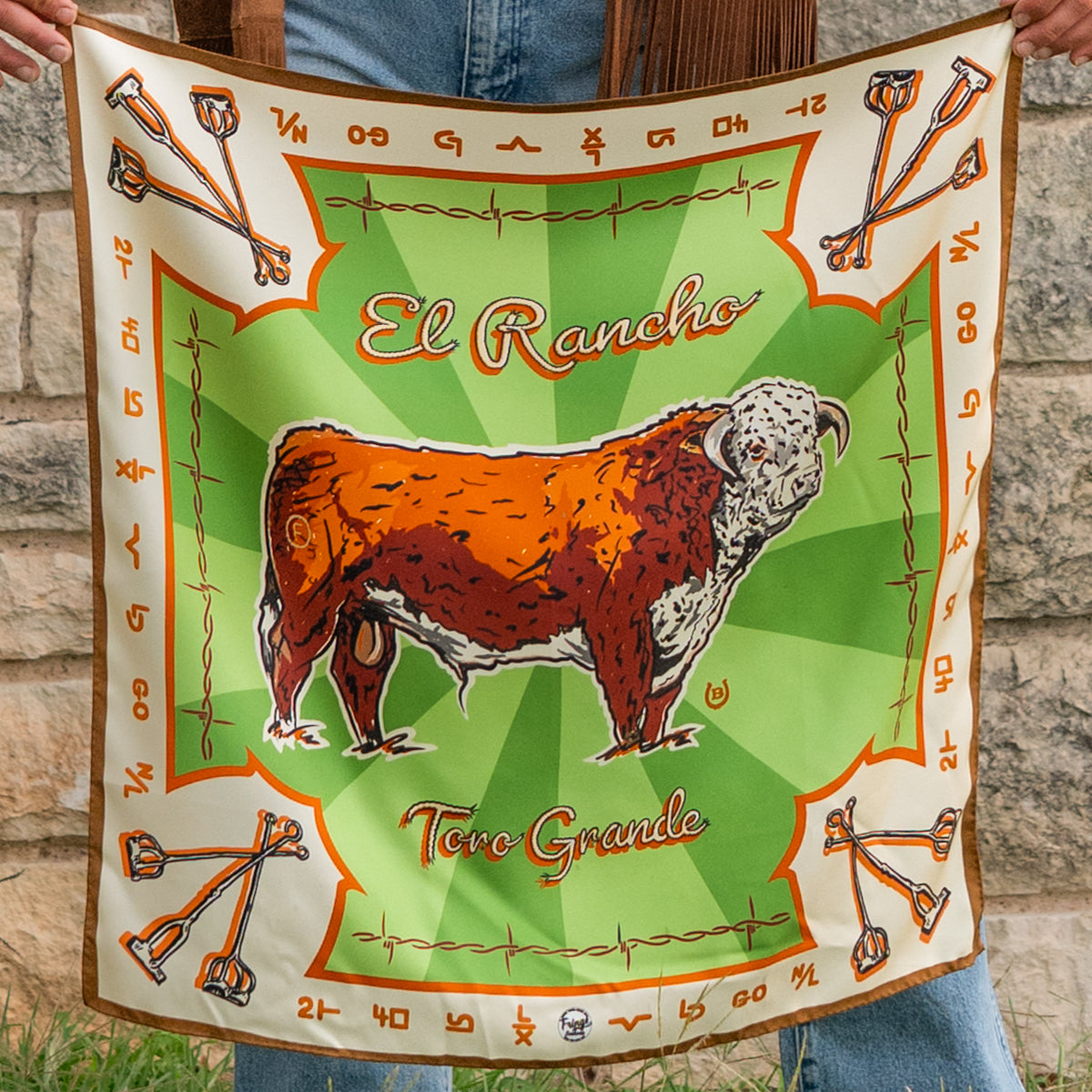 Fringe Scarves Toro Grande Silk Scarf Hereford bull with branding iron motifs on a 60s green ground with orange and tan womens western boutique Utah SKU SCRFTRGDSH25062