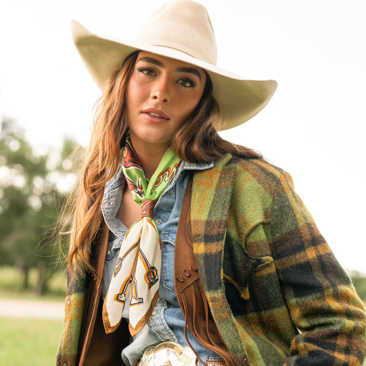 Fringe Scarves Toro Grande Silk Scarf draped long with tails tucked into a vest cowgirl style