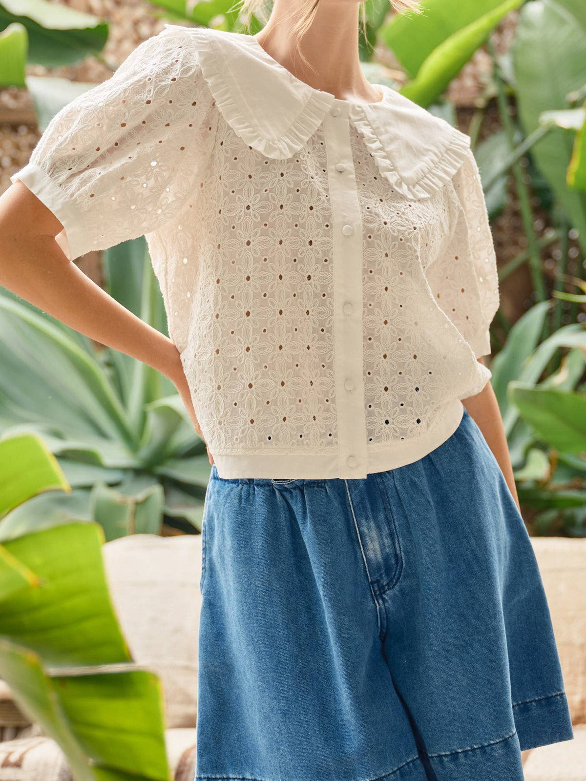 Eilyn Ruffle Collar Eyelet Blouse with a peter pan ruffle collar and eyelet detail throughout the shirt at boltranchstore.com