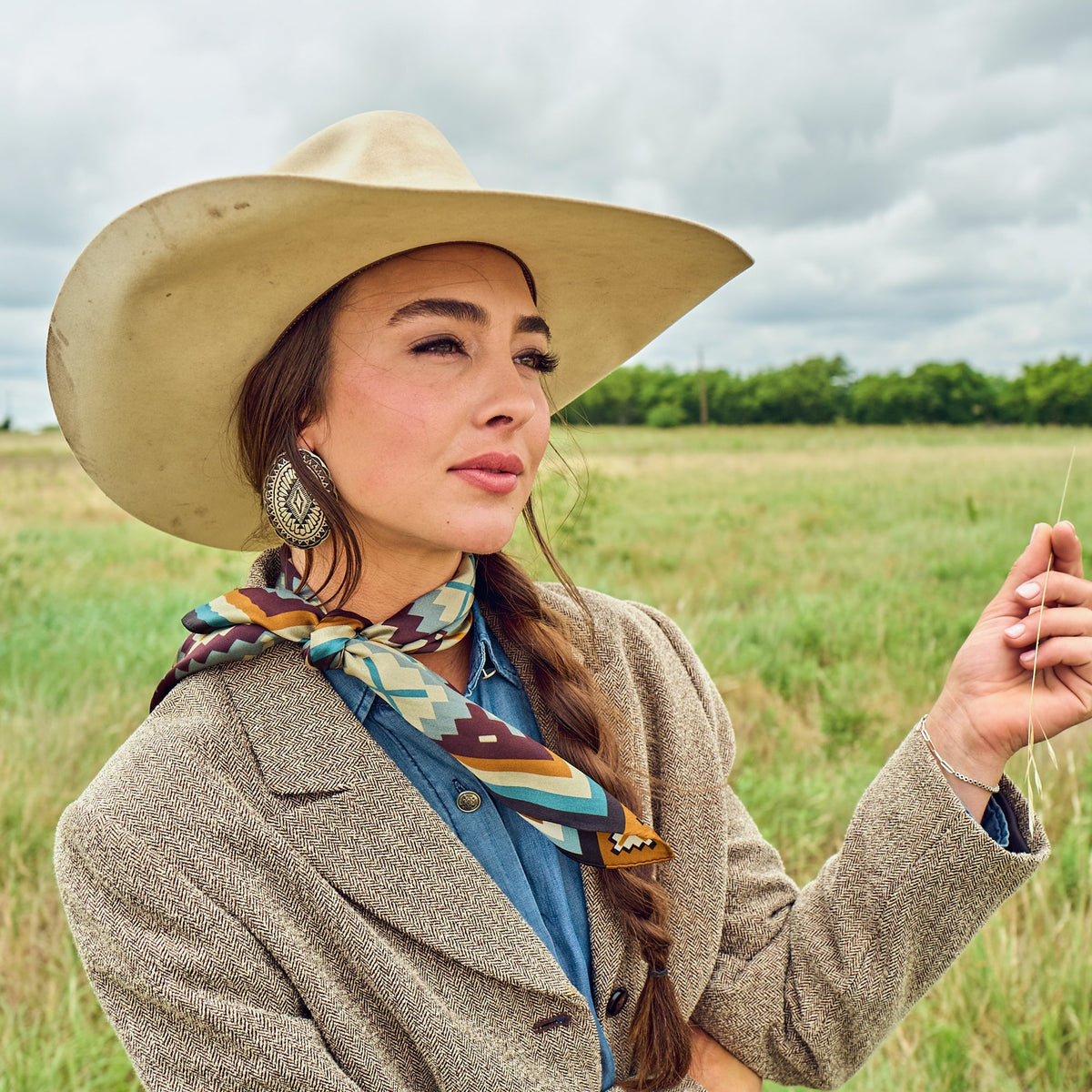 Fringe El Azteca Silk Scarf Chambray ties in a bow for a softer look western clothing