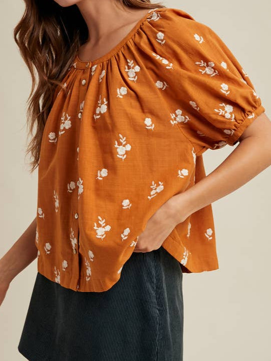 Fallon Floral Embroidered Button Shirt made of cotton with a full button up, embroidered flower