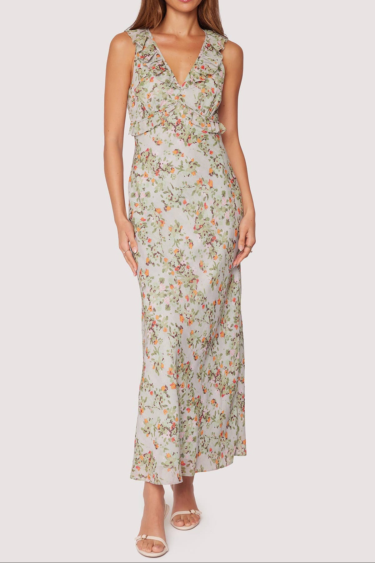 Woman wearing a floral dress on a white background fields maxi dress shop at boltranchstore.com today doendupe