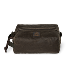 Filson Tin Cloth Travel Kit features awaxed canvas toiletry bag with a zipper and handle at boltranchstore.com