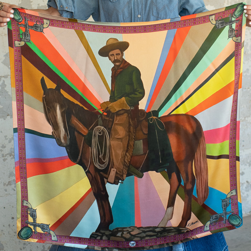 Fringe Son of the West Silk Scarf Kevin Chupik painting of a cowboy on horseback against vibrant color rays womens western boutique Utah SKU SCRFSWSTSH0318