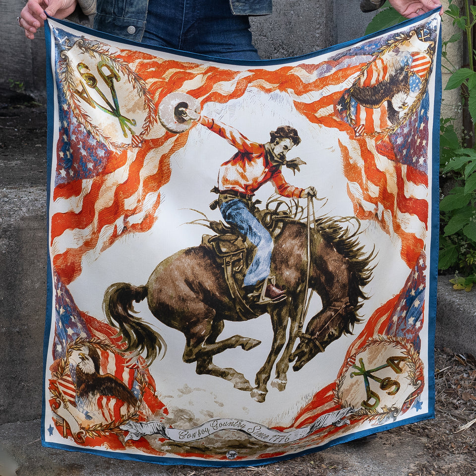 Fringe Cowboy Country scarf at boltranchstore.com  free shipping in stock Scarf with a cowboy and horse design featuring American flags
