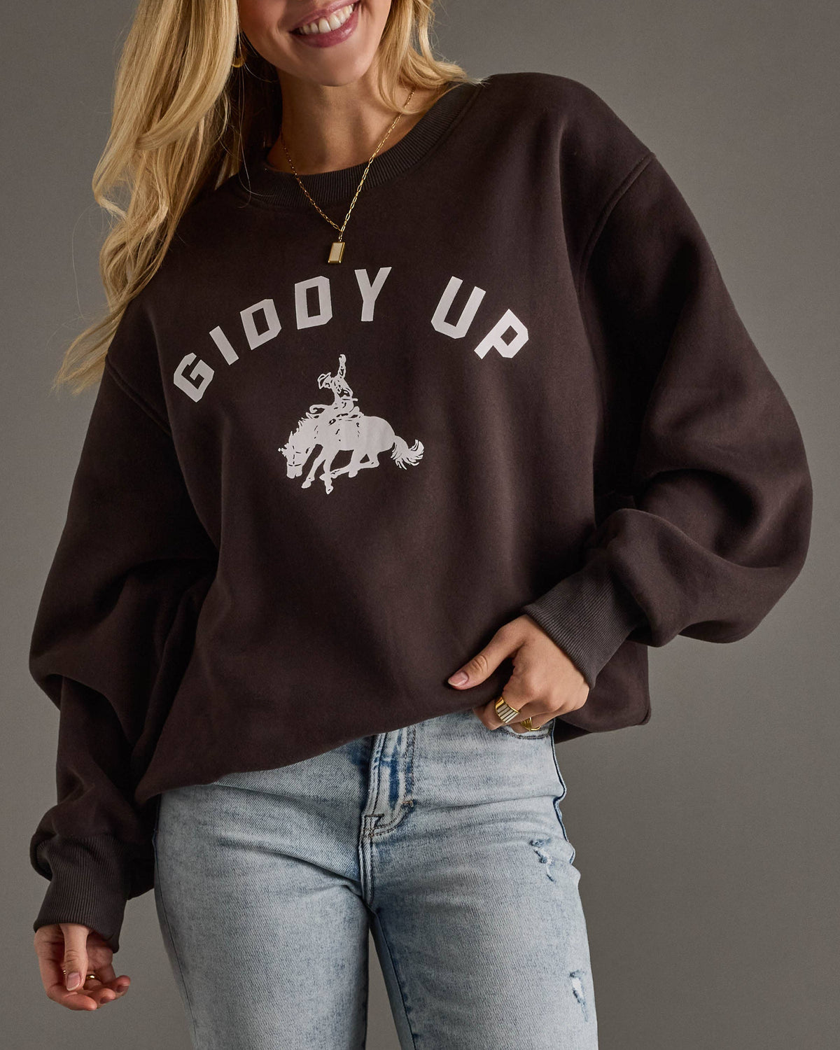 'Giddy Up' sweatshirt with a horse graphic in a long sleeve charcoal with a white print at boltranchstore.com