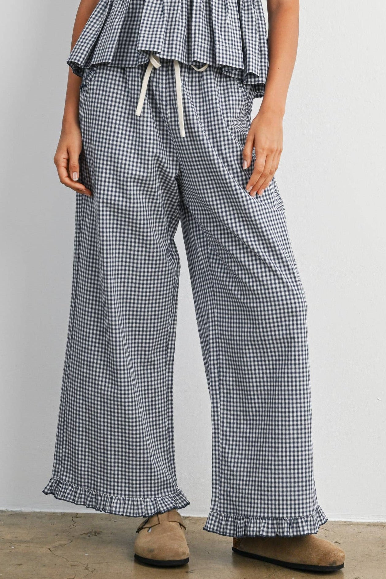 gingham pants with pockets drawstring and ruffle hem cropped pants navy ivory sonderhaus dupe cotton poly blend boltranchstore.com free shipping 