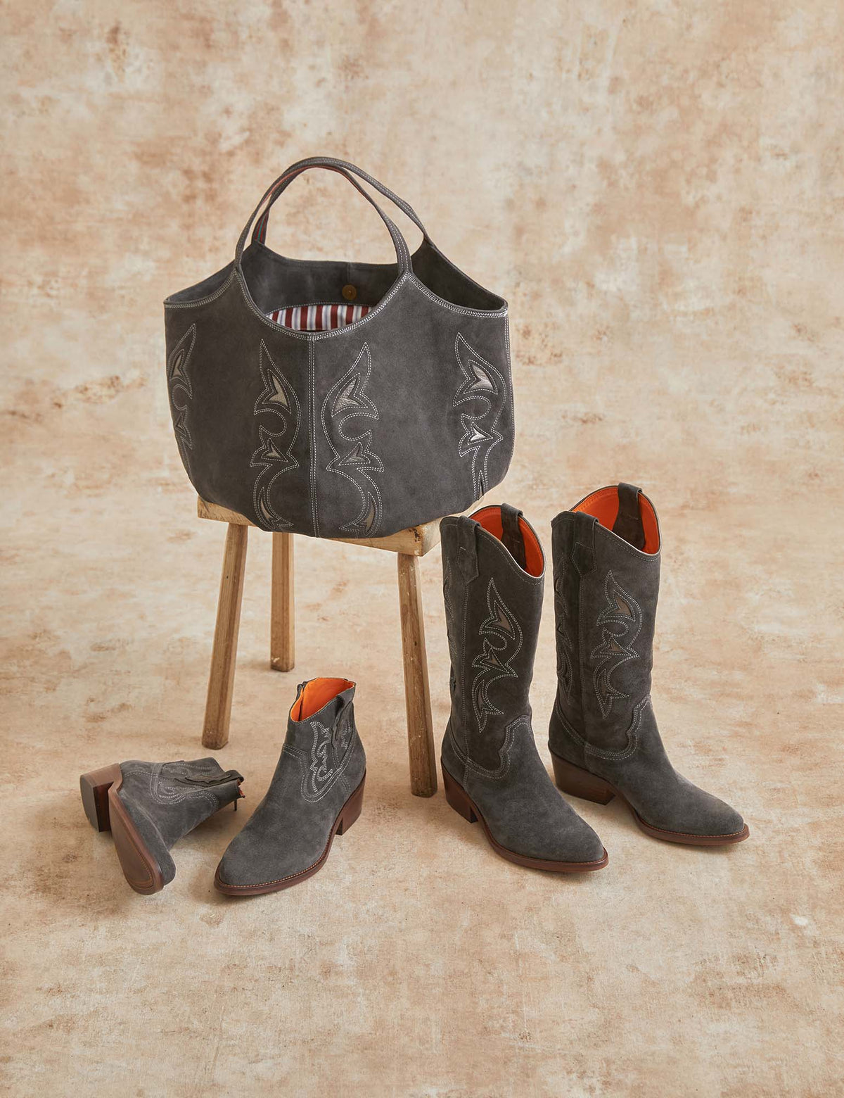 Penelope Chilvers Pillow Paloma Bag styled with matching slate Goldie Paloma boots western fashion