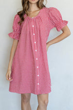 Grace Gingham Babydoll Dress features round neck button up front ruffle sleeves in a red or navy gingham babydoll dress at boltranchstore.com