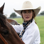 Fringe Willow Navy Silk Scarf pairs with a denim jacket knotted loose Park City