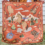 Fringe Happy Trails Silk Scarf Cayenne retro cowgirl on horseback with western gear in each corner on cayenne womens western boutique Utah SKU SCRFHPTLCYRDSH26037