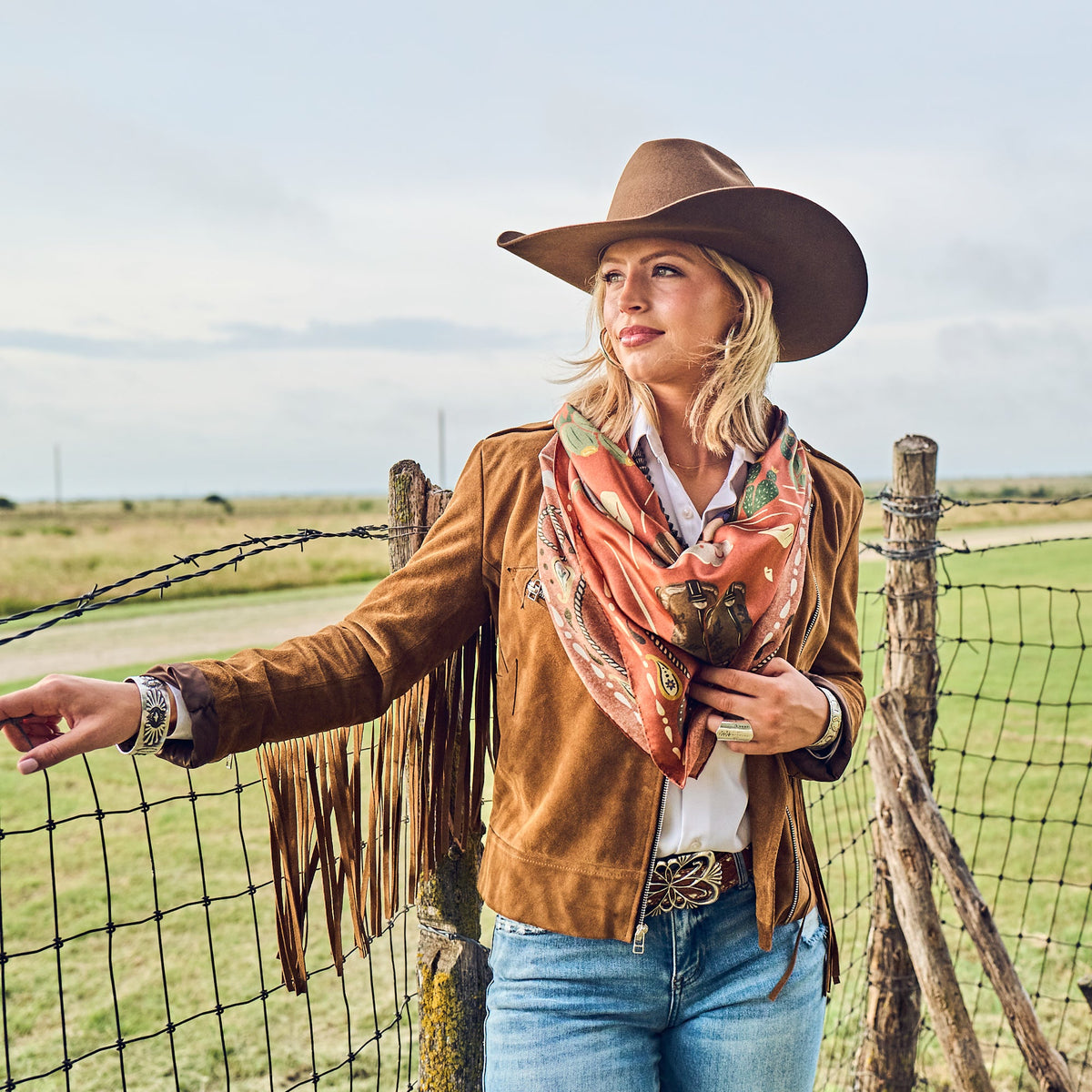 Fringe Happy Trails Silk Scarf Cayenne pairs with a denim jacket knotted loose Park City