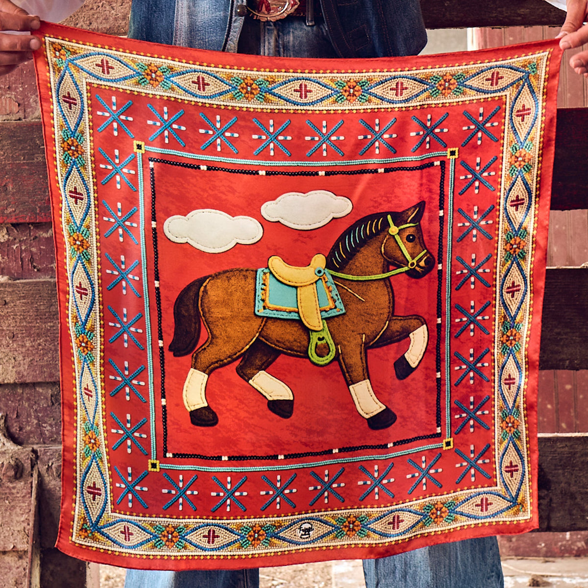 Fringe Head in the Clouds Silk Scarf prancing horse beneath soft clouds on a red ground with beadwork inspired borders womens western boutique Utah SKU SCRFHDCLREDLT26052