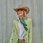 Fringe Hi Yo Silver Silk Scarf Hunter Green holds a scarf slide at the collar ranch wear Kamas