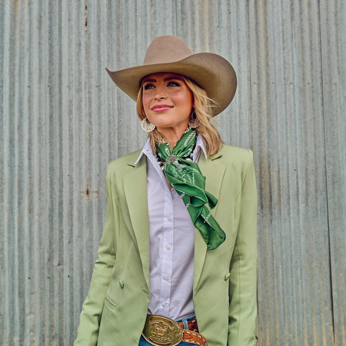 Fringe Hi Yo Silver Silk Scarf Hunter Green holds a scarf slide at the collar ranch wear Kamas