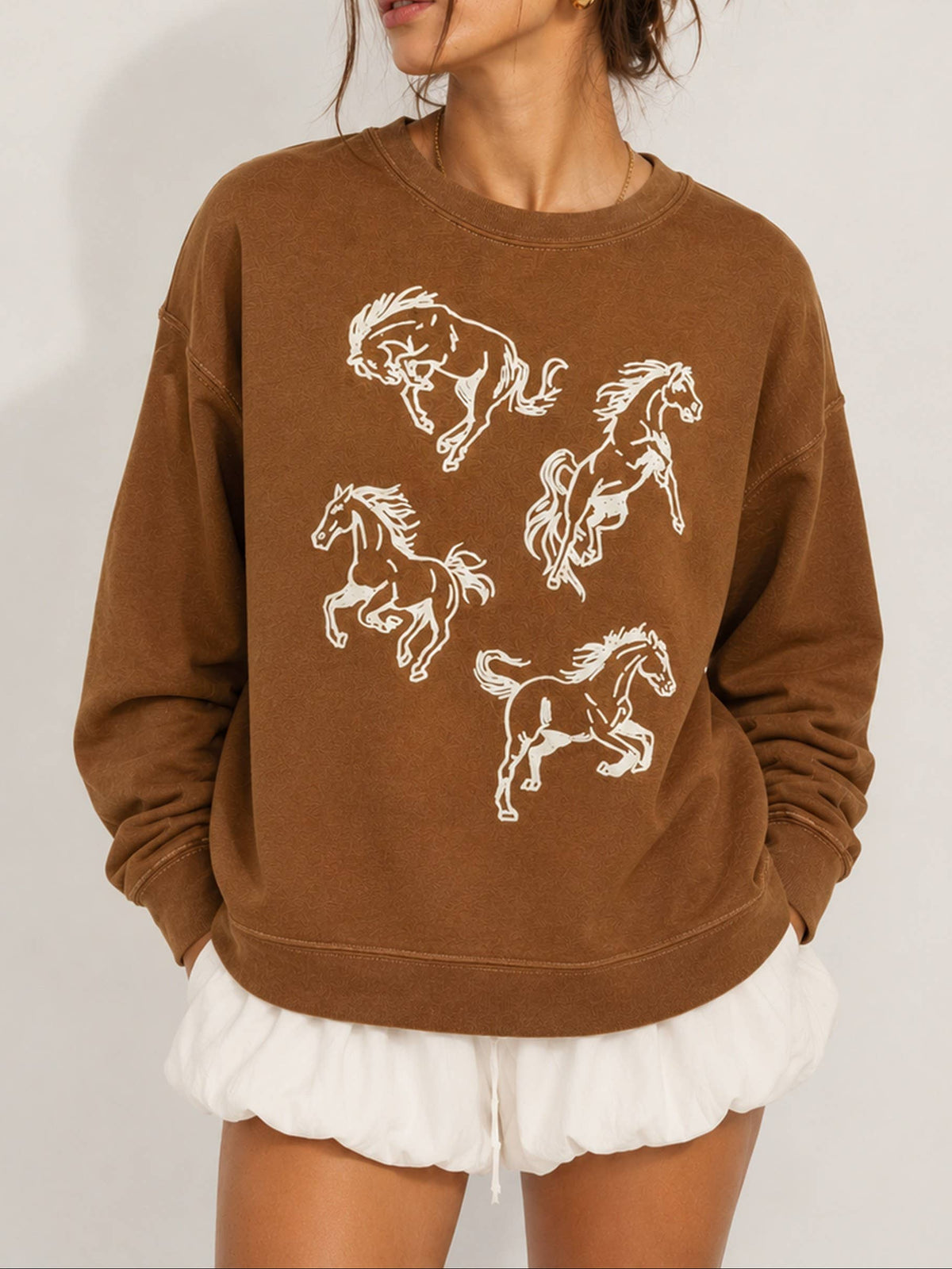 Horses Puff Print Sweatshirt brown crewneck sweatshirt with white embroidered horse designs in stock