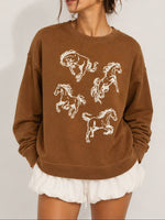 Horses Puff Print Sweatshirt brown crewneck sweatshirt with white embroidered horse designs in stock