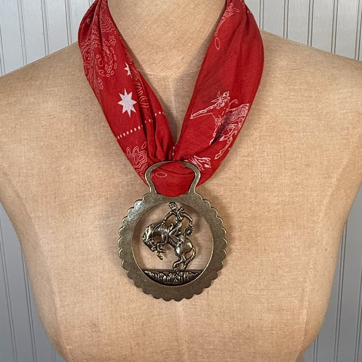 Fringe Slide Harnessed Bronc Rider horse brass style medallion with a bronc rider and split top opening womens western boutique Utah SKU SLDEHRNBR26118
