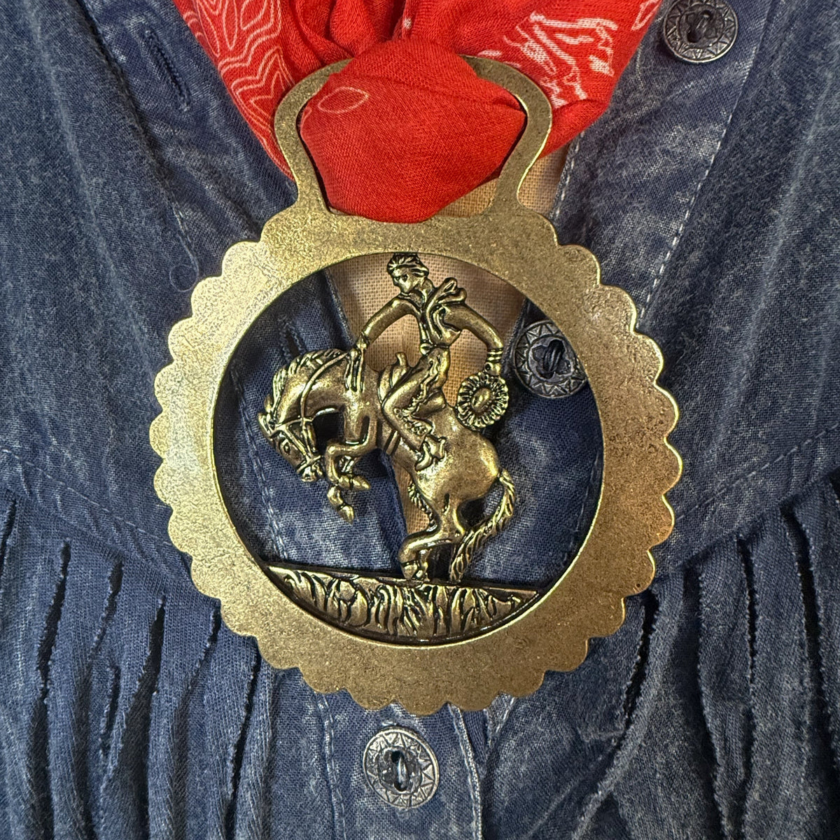 Fringe Slide Harnessed Bronc Rider slide back lays flat to keep it from spinning western fashion