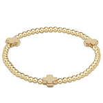 Gold bracelet with bead-like beads and cross-shaped bead boltranchstore.com