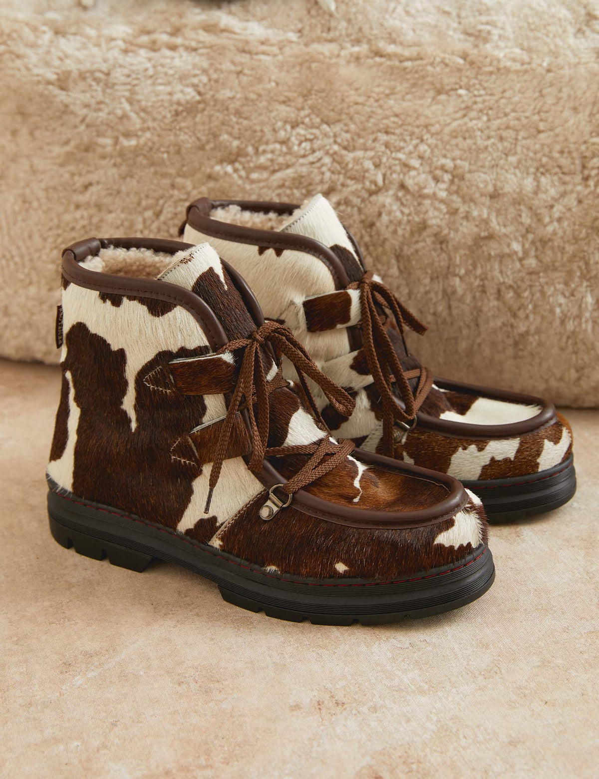 Penelope Chilvers Incredible Friesian Shearling Lined Boot brown and white Friesian pony cowhide winter boot womens western boutique Utah SKU WINCFRIESPONAW26