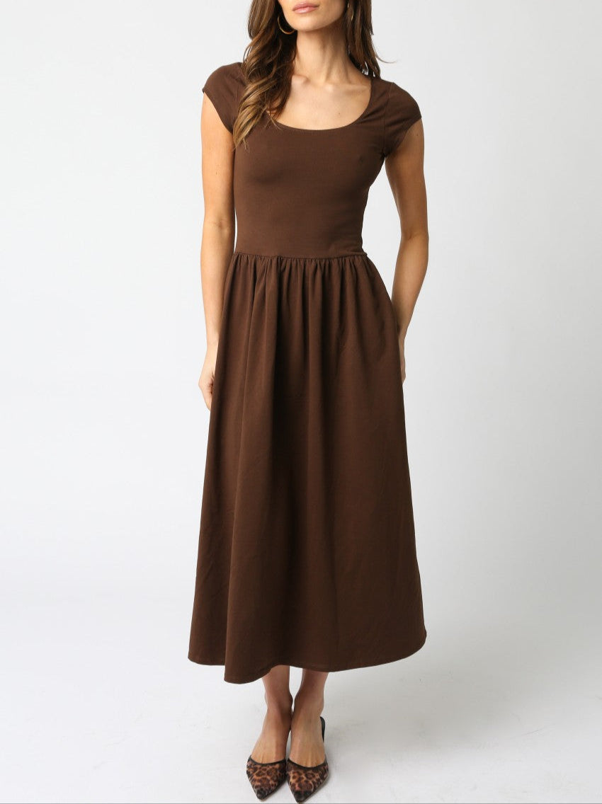 The Jane Midi Dress combines effortless style with practical comfort. Featuring short sleeves for easy movement and convenient pockets Boltranchstore.com free shipping