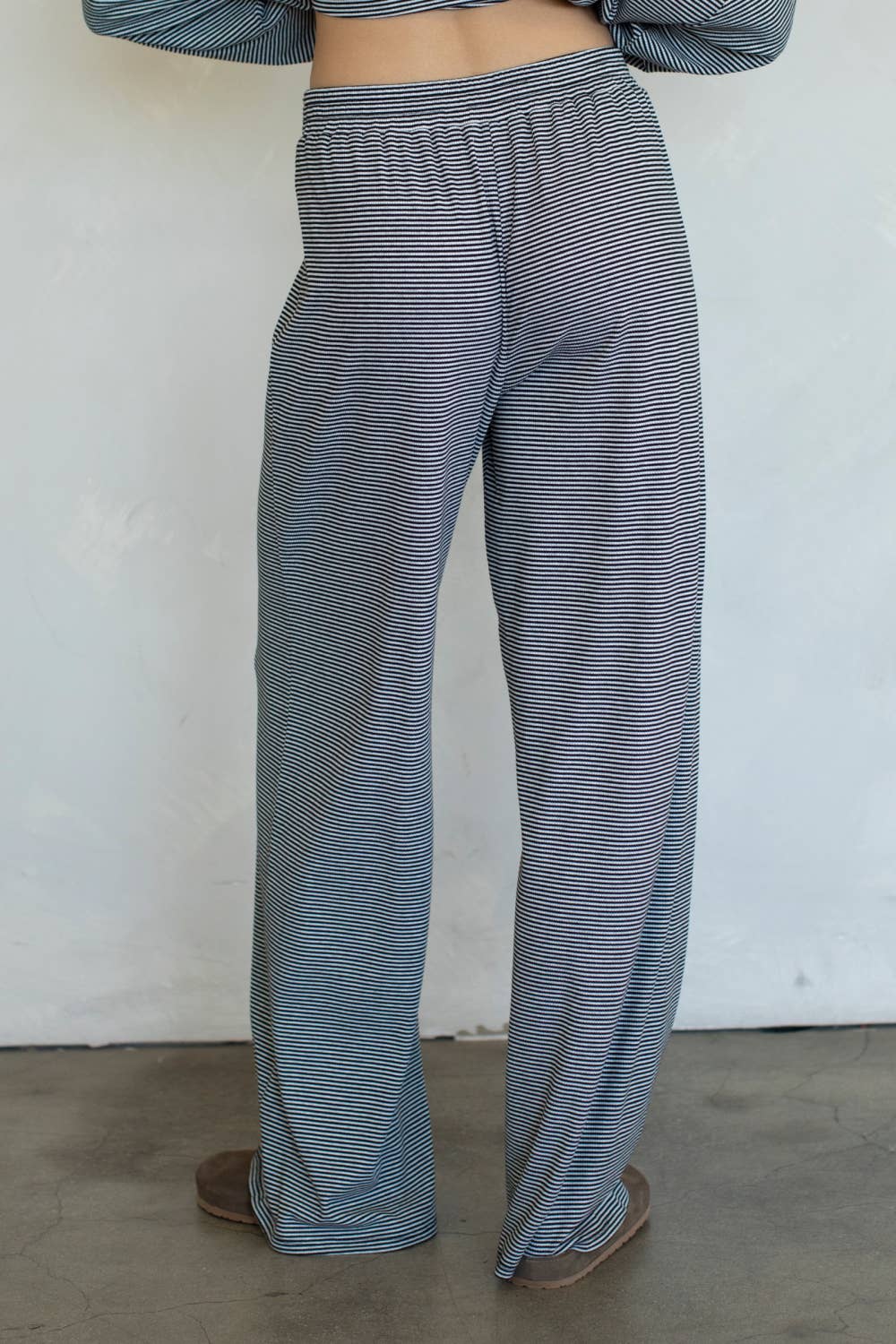 Kenzie Pants shop at boltranchstore.com Person wearing blue and white striped pants against a plain background