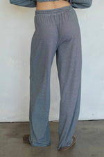 Kenzie Pants shop at boltranchstore.com Person wearing blue and white striped pants against a plain background