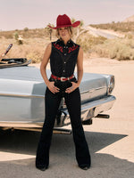 Lainey Wilson X Wrangler Flare Jeans a dark rinse jean with a red wrangler back patch high rise jean at boltranchstore.com