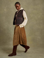 Penelope Chilvers Lancaster Cotton Velvet Skirt paired with chocolate suede western boots