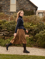Penelope Chilvers Lancaster Cotton Velvet Skirt dressed up with tall tassel boots for western fashion