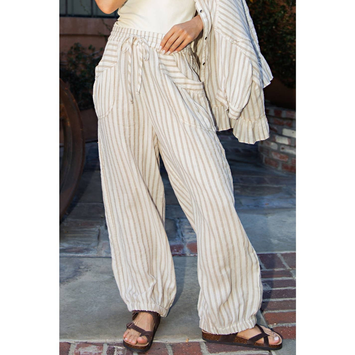 Lara Womens Striped Linen Pants at boltranchstore.com free shipping summer and spring pants lake day over up pants summer break outfit beach outfit summer of 2026 in stock Person wearing striped pants 