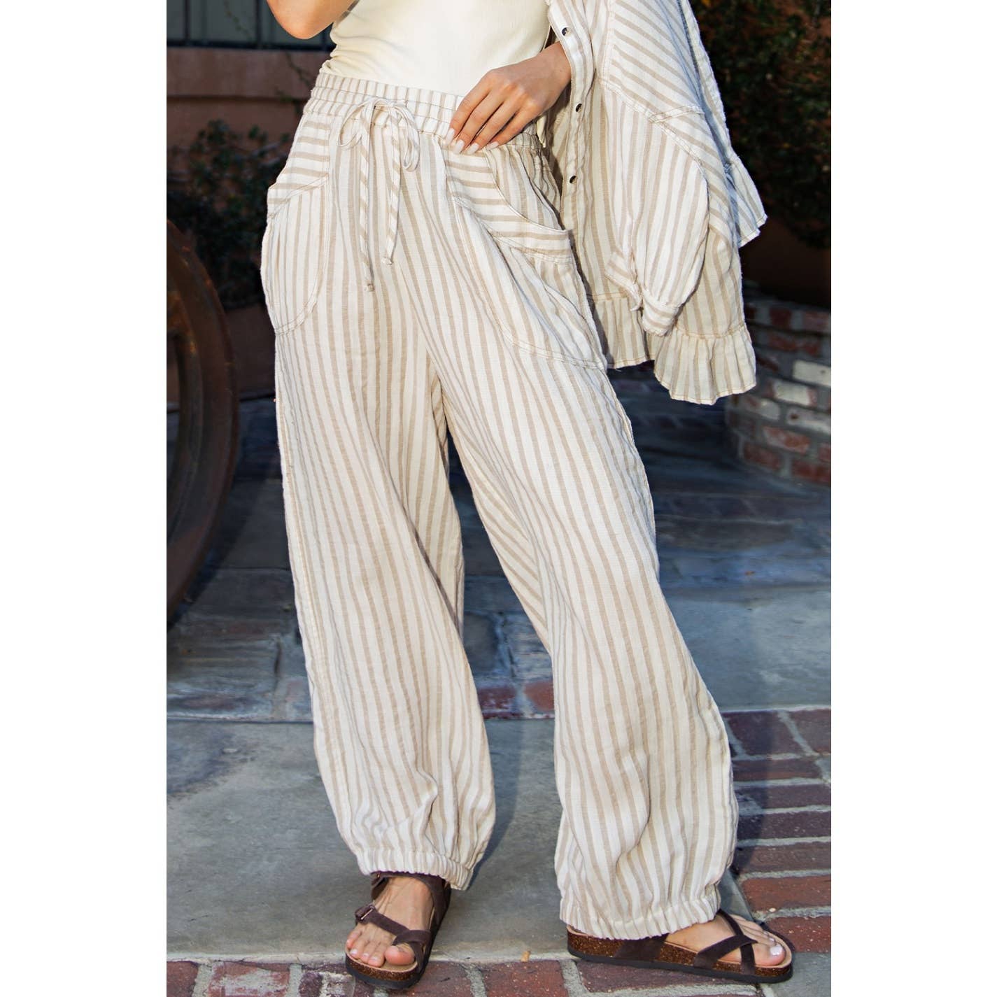 Lara Womens Striped Linen Pants at boltranchstore.com free shipping summer and spring pants lake day over up pants summer break outfit beach outfit summer of 2026 in stock Person wearing striped pants 