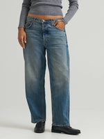 Lee Womens Low Slung Slouch Jean at boltranchstore.com  in stock free shipping womens jeans A person wearing medium-wash blue denim jeans with a relaxed straight-leg fit, 