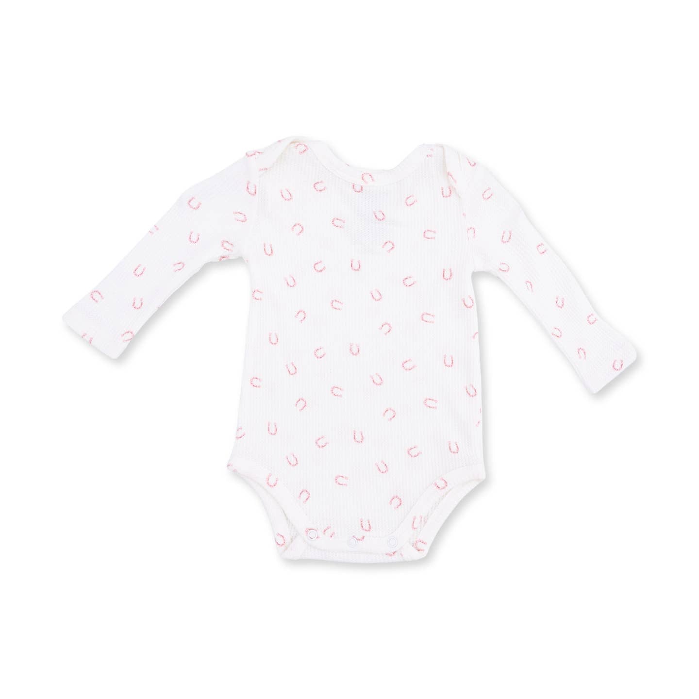 A white long-sleeve baby bodysuit with a delicate pink horseshoe pattern, displayed flat against a clean white background. Little Horseshoes Pink Long Sleeve Bodysuit Shop today at boltranchatore.com