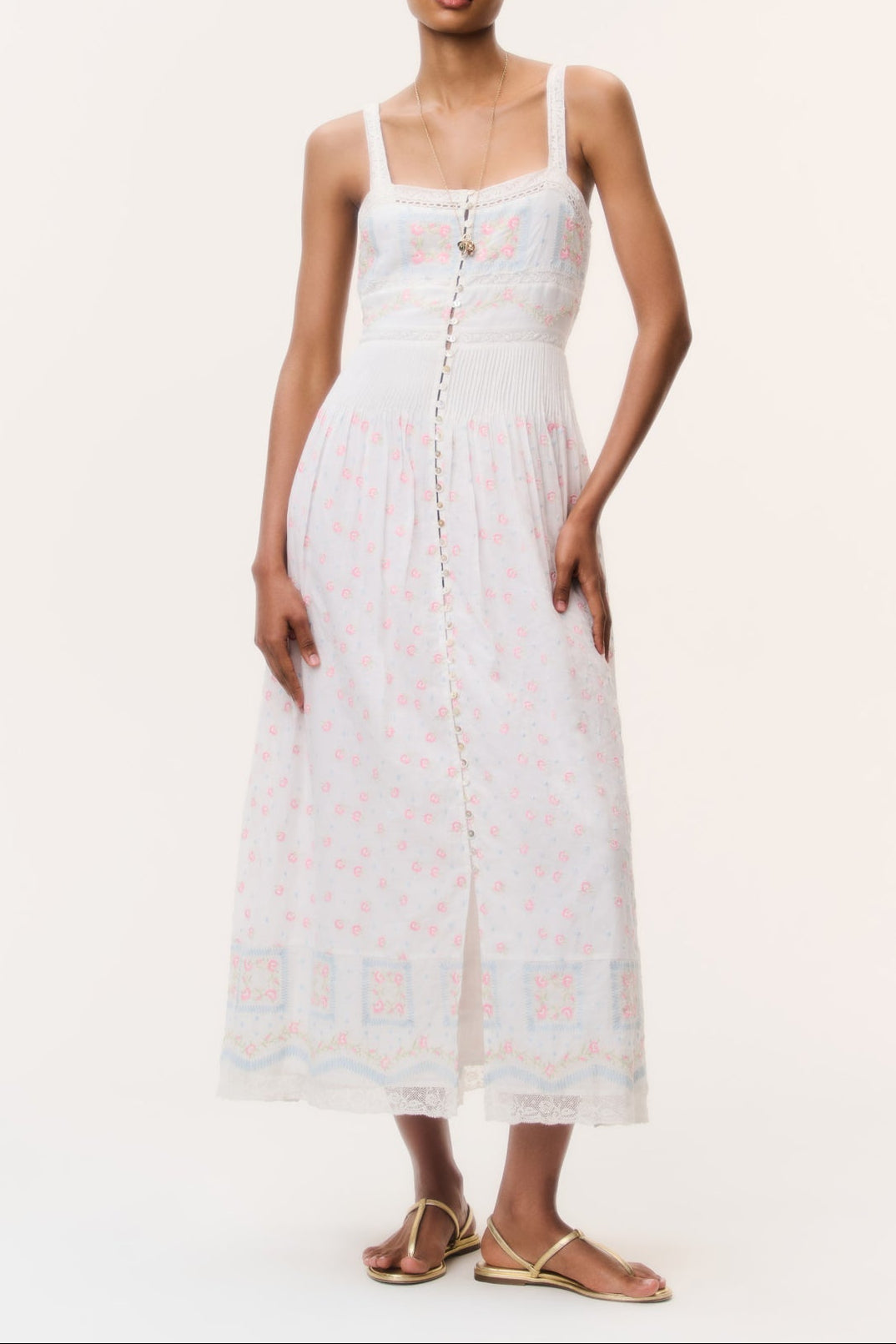LoveShackFancy Cerys Embroidered Cotton Maxi Dress at boltranchstore.com with free shipping  summer dress floral dress wear with boots tank top dress new arrival in stock Woman wearing a white dress with thin straps 