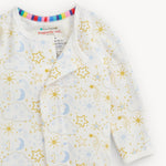 Magnetic Me Star Signs Blue Modal Footie magnetic closures running from the neckline down the leg with rainbow striped collar trim