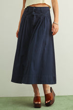 Millie Midi skirt with two front buttons and a zipper its midi length with side pockets at boltranchstore.com with free shipping