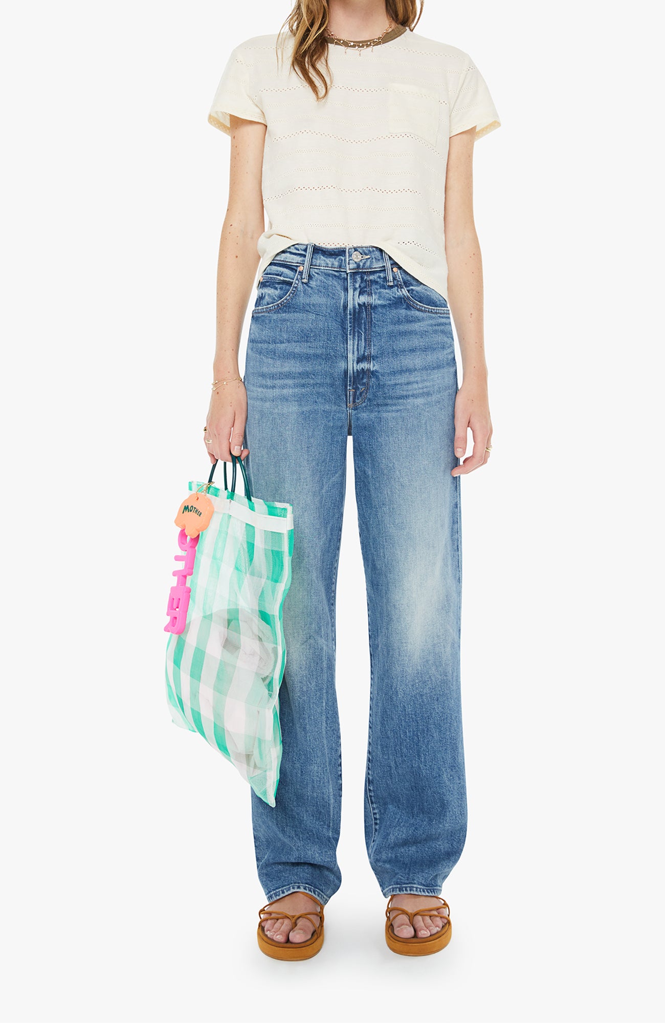 Mother High Waisted Tunnel Vision Sneak in the wash girls want to have sun in a medium wash with fading at the knees at boltranchstore.com
