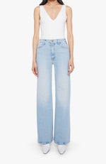 Mother The Hustler Roller Sneak Complete 360 These light-wash jeans feature a clean, modern silhouette with a flattering high-rise waist and a relaxed wide-leg fit. Designed to elongate the leg, they fall straight from the hip with an easy drape and finished hem. Classic five-pocket styling is complemented by subtle back-pocket stitching for a refined touch. Versatile and effortless, this pair pairs perfectly with fitted tanks, bodysuits, or cozy knits for everyday wear.