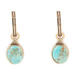 A pair of gold drop earrings featuring oval turquoise cabochon stones with natural matrix, set in a teardrop-shaped bezel with geometric triangular detailing on the gold setting.Nova Half Hoop Turquoise and Bronze Earrings at boltranchstore.com free shipping