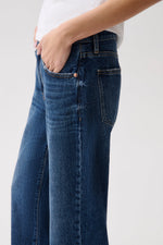 Lexi Mid Rise Bowed Straight Jean Moonwave zip fly with button closure and tonal topstitching on the front pocket