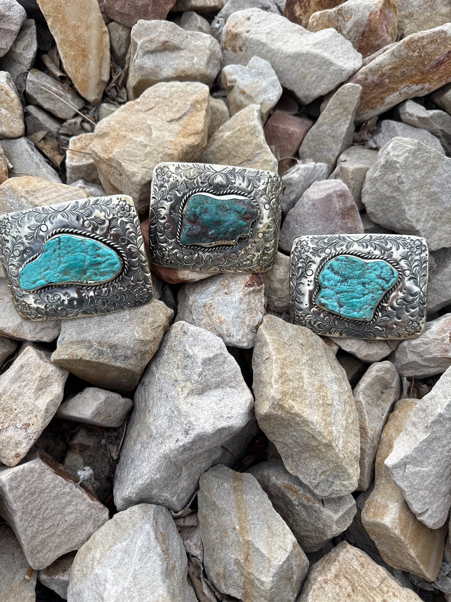 Paige Wallace Rectangle Turquoise Flower Buckle sterling silver belt buckle with turquoise stone in the middle at boltranchstore.com