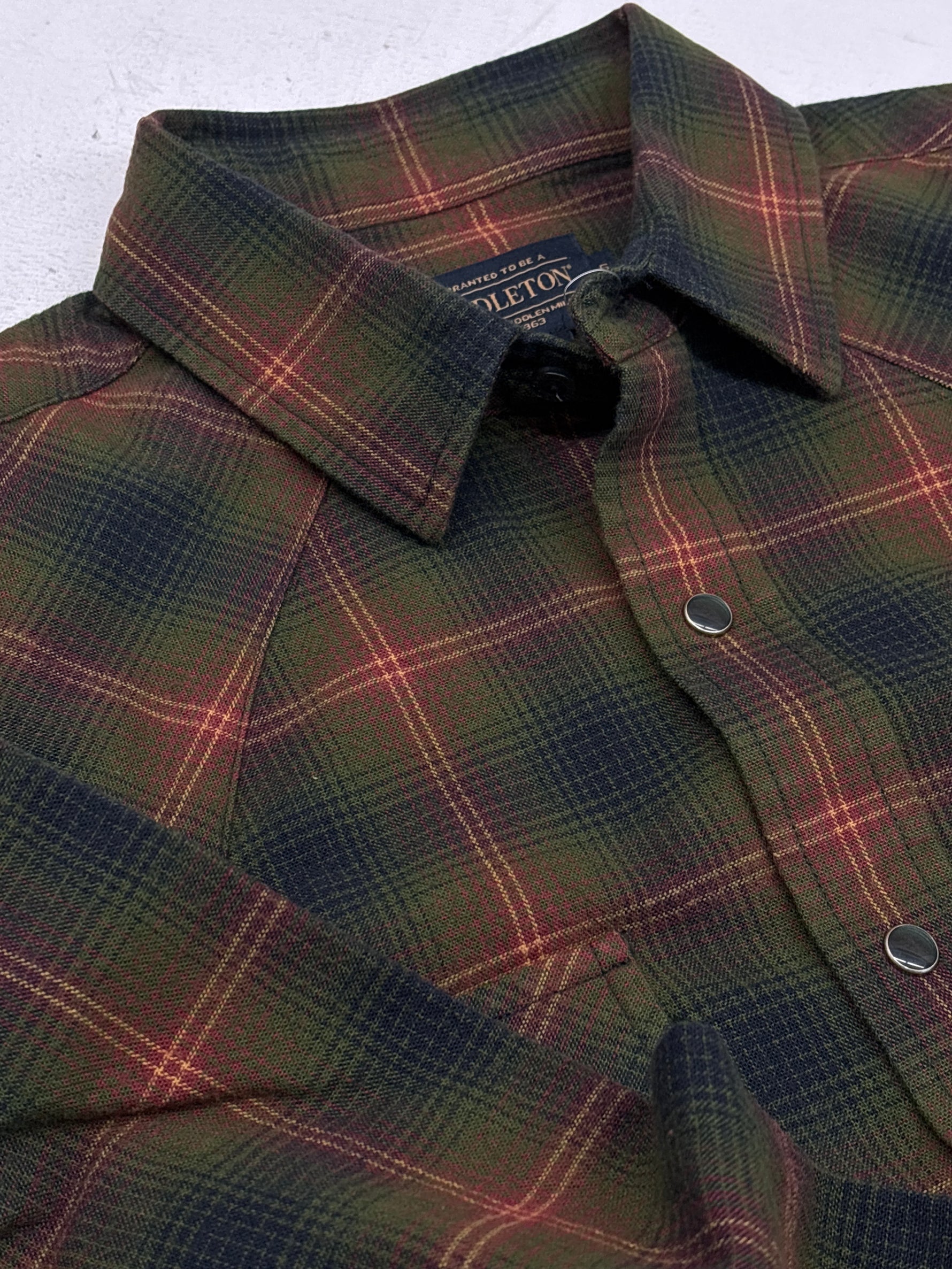 Pendleton Mens Wyatt Shirt flannel in green navy plaid and pearl snap button down closeup