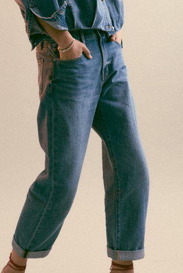 Pistola Donny Rolled Hem Boyfriend Jean in a indigo wash with natural fading and whiskering and a high rise jean with a relaxed top opens into a bowed wide leg and a double rolled cuff available at boltranchstore.com