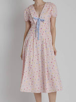 Polly Polka Dot Collared Midi Dress with a collar and bow tie front with multi color polka dots on a pink dress a fun in the sun birthday dress at boltranchstore.Com free shipping summer dress