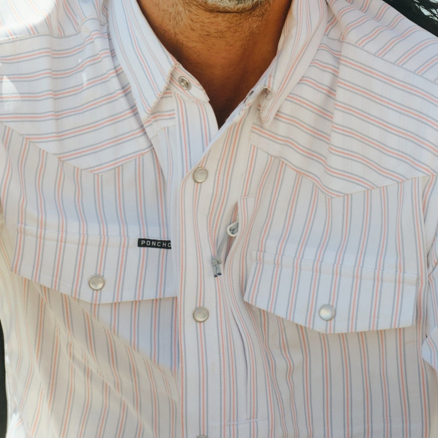 Poncho Mens The 1776 Shirt a snap up front with two snap down pockets with a red and blue pin stripes at boltranchstore.com