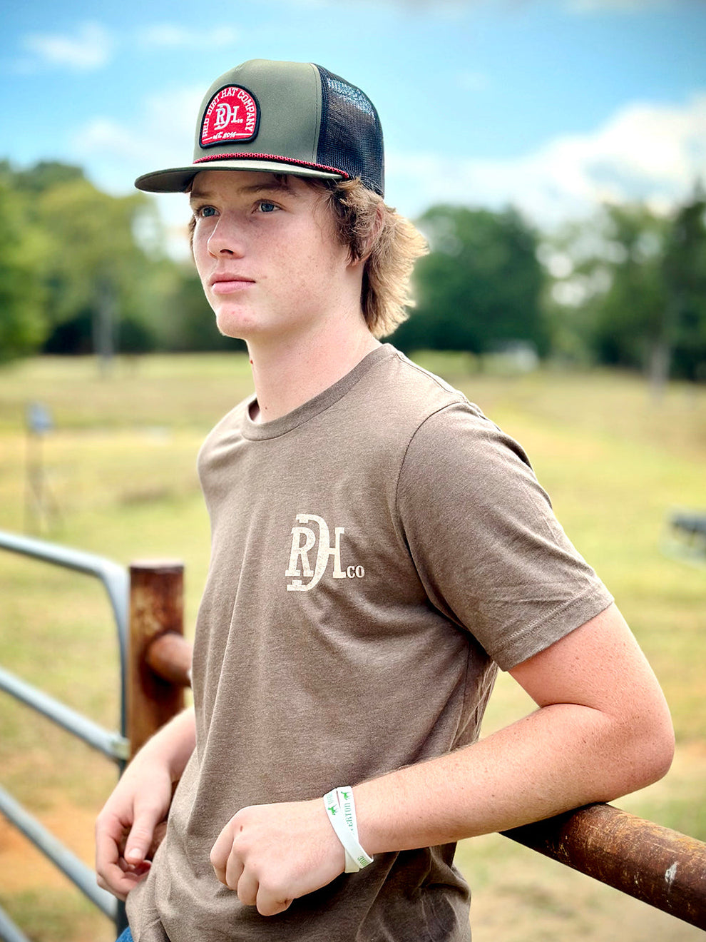 Red Dirt Hat Ruger Patch Hat an olive hat with Red Dirt Hat Patch and black mesh snap back flat bill hat available at boltranchstore.com