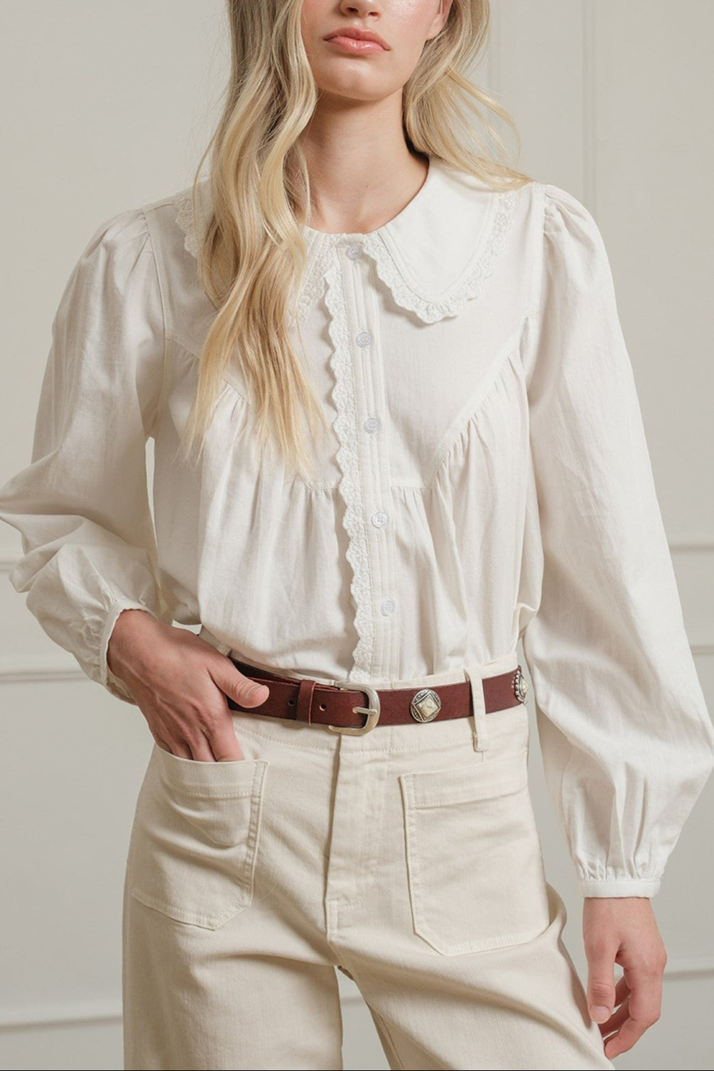 Reese Round Collar Blouse a ruffle button up front shirt with long sleeves and a round collar